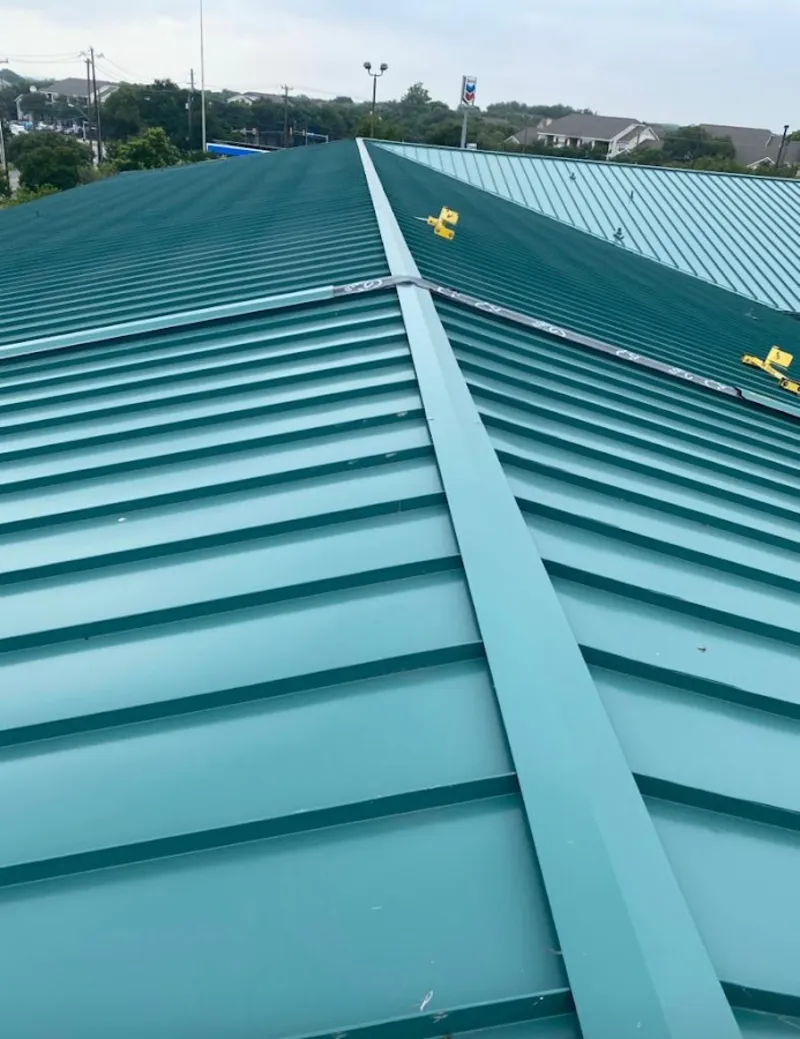 Green commercial metal roof ridge and valley for Metal Roof Repair in Mayville